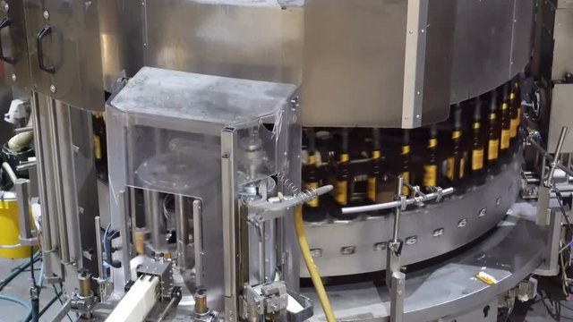 Line for bottling beer and labeling bottles