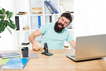Spoiled communication. Failed mobile negotiations. Most annoying thing about work in call center. Incoming call. Annoying client calling. Man bearded guy headphones office swing hammer on smartphone
