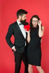 Do not play with my heart. Man with beard and woman happy celebrate anniversary. Couple in love dating anniversary. Man tuxedo and girl hold hear soft toy romantic anniversary. Valentines day holiday
