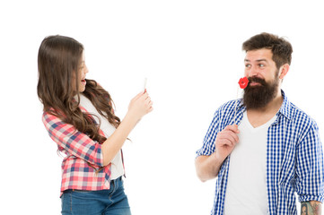 Taking mobile photo. Capture happy moments. Dad and daughter having fun. Father and daughter taking photo. Family posing photo. Social networks and online community. Girl taking smartphone photo