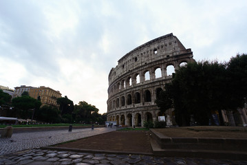 Fototapeta na wymiar Colosseum or Coloseum at dusk from in front of Metro night, Rome Italy