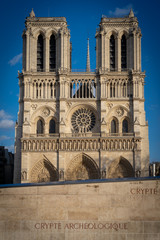 Fototapeta na wymiar Paris, France - 03 10 2019: Façade of Notre-Dame of Paris. Archeological crypt