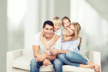 Fototapeta na wymiar Beautiful smiling Lovely family indoors