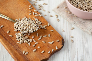 Raw hulled sunflower seeds, side view. Close-up.
