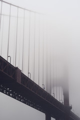 Heavy morning fog surrounds the Golden Gate Bridge