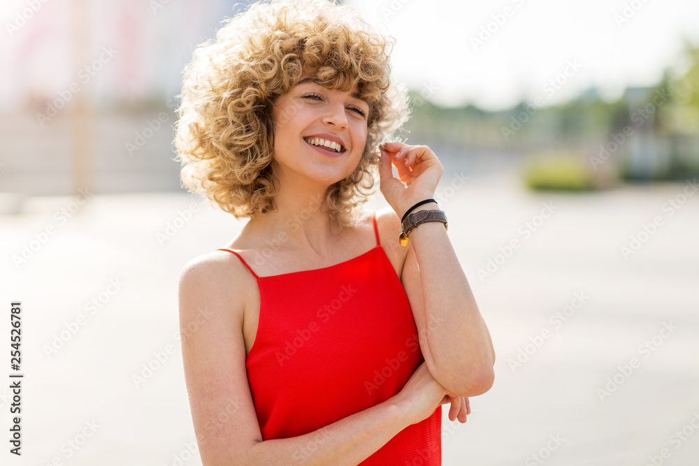 Canvas Prints Portrait of young woman with curly hair