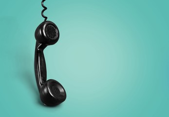 Red telephone receiver  on  background