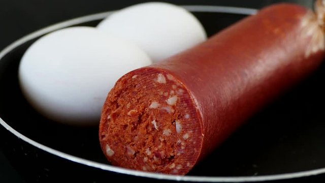 raw sausage and eggs,