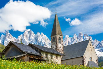 Italy, South Tyrol, Vilnoess Valley, View to Church of St. Magdalena, Sass Rigais and Geisler group in the background