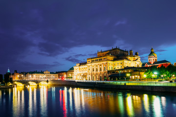 Stockholm Sweden. Scenic Night View Of Illuminated Royal Swedish Opera Theatre, Norrbro Arch Bridge