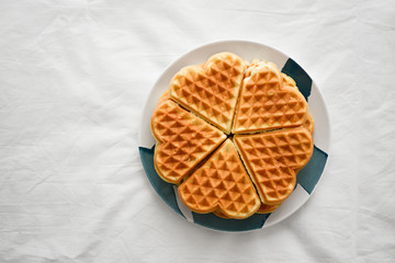 heart shaped waffles on a plate 