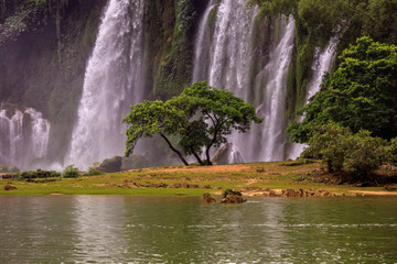 Detian Waterfall - Ban Gioc, International border between China and Vietnam. Strong powerful water,...