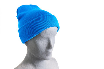 Bright colored cap on mannequin isolated on white