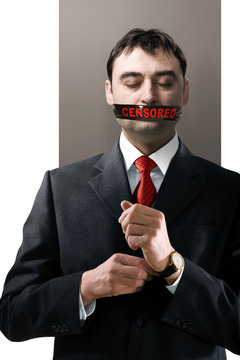 man with black censored tape