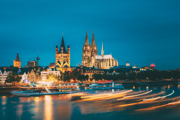 Obraz premium Great St. Martin Church And Dom In Cologne At Evening With Reflection In River Rhine, Germany