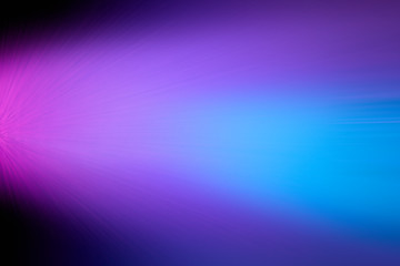 Scattered ray of light with elements of pink and blue in blur
