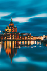Fototapeta premium Helsinki, Finland. View Of Kanavaranta Street With Uspenski Cathedral In Evening Night Illuminations