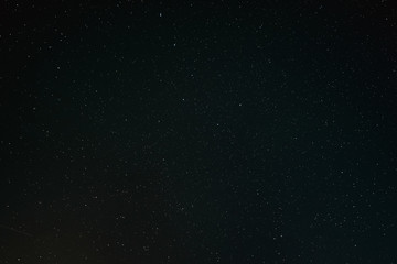 Black Dark Night Starry Sky Background. Night View Of Natural Glowing Stars