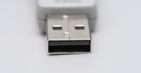 White usb stick macro shot isolated on white background. Copy space