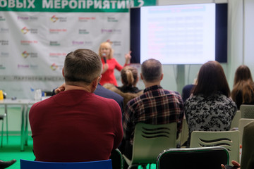 Moscow, Russia - March, 2, 2019: image of people sitting at a conference
