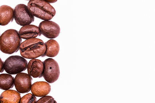the image of a coffee beans under the white background
