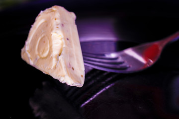 image of melted cheese on a fork
