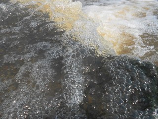 Spring rapids with foam.