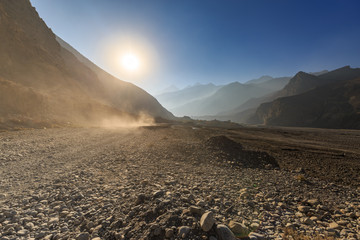 Car on a road in the Kali Gandaki Valley on the Annapurna circuit between Mukhtinath and Jomson,...