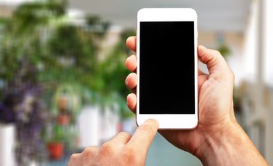 Smartphone back behind black blank business camera
