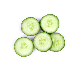 Fresh cucumber slices isolated on white background, top view