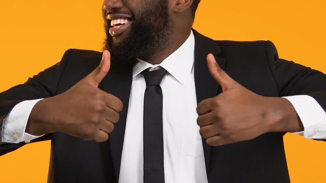 African-American business man showing thumbs up, new project development