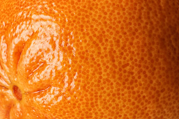 Ripe orange as background, closeup. Citrus fruit