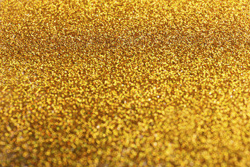Closeup view of sparkling golden glitter background