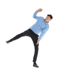 Obraz premium Emotional man in office wear posing on white background