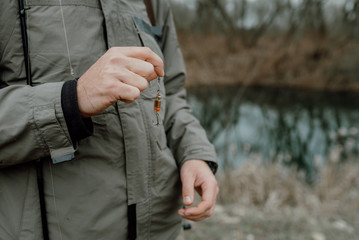 Angler holding a bait