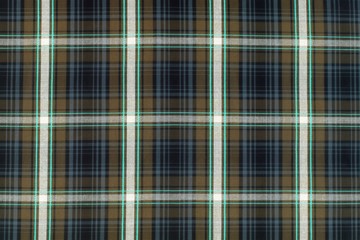 Texture cotton colored fabric in a cage. Background abstraction