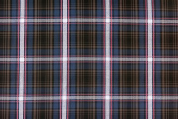 Texture cotton colored fabric in a cage. Background abstraction