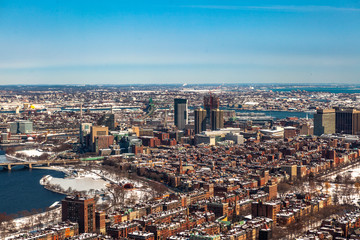 Fototapeta na wymiar Boston, USA- March 08, 2019: panorama, a view from the air on the snowy Boston streets, Massachusetts, United States.