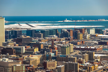 Fototapeta premium Boston, USA- March 08, 2019: panorama, a view from the air on the snowy Boston streets, Massachusetts, United States.