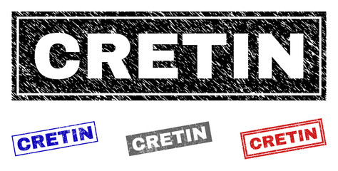 Grunge CRETIN rectangle stamp seals isolated on a white background. Rectangular seals with grunge texture in red, blue, black and grey colors.