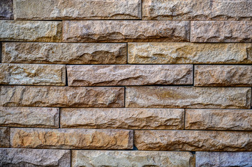 Old brown stone bricks wall pattern background of brick wall