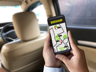 mobile application Ride share taxi service on phone man holding phone