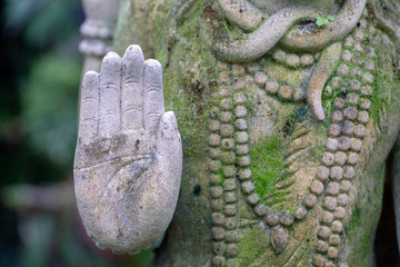 The palm of the stone statue in Ubud, island Bali, Indonesia , closeup