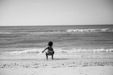 Fototapeta na wymiar boy on the beach