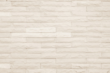Cream and white brick wall texture background.