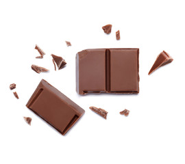  Broken chocolate isolated on white background. Top view.