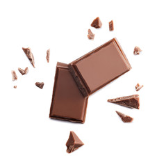  Broken chocolate isolated on white background. Top view.