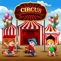 Obraz na płótnie Canvas Happy children playing on the circus arena
