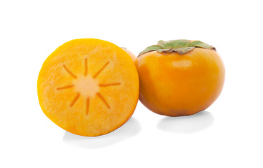 Tropical fruit persimmon. Kaki with leaves on white background.