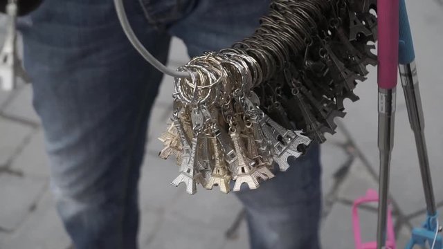 Buying eiffel tower key chain.